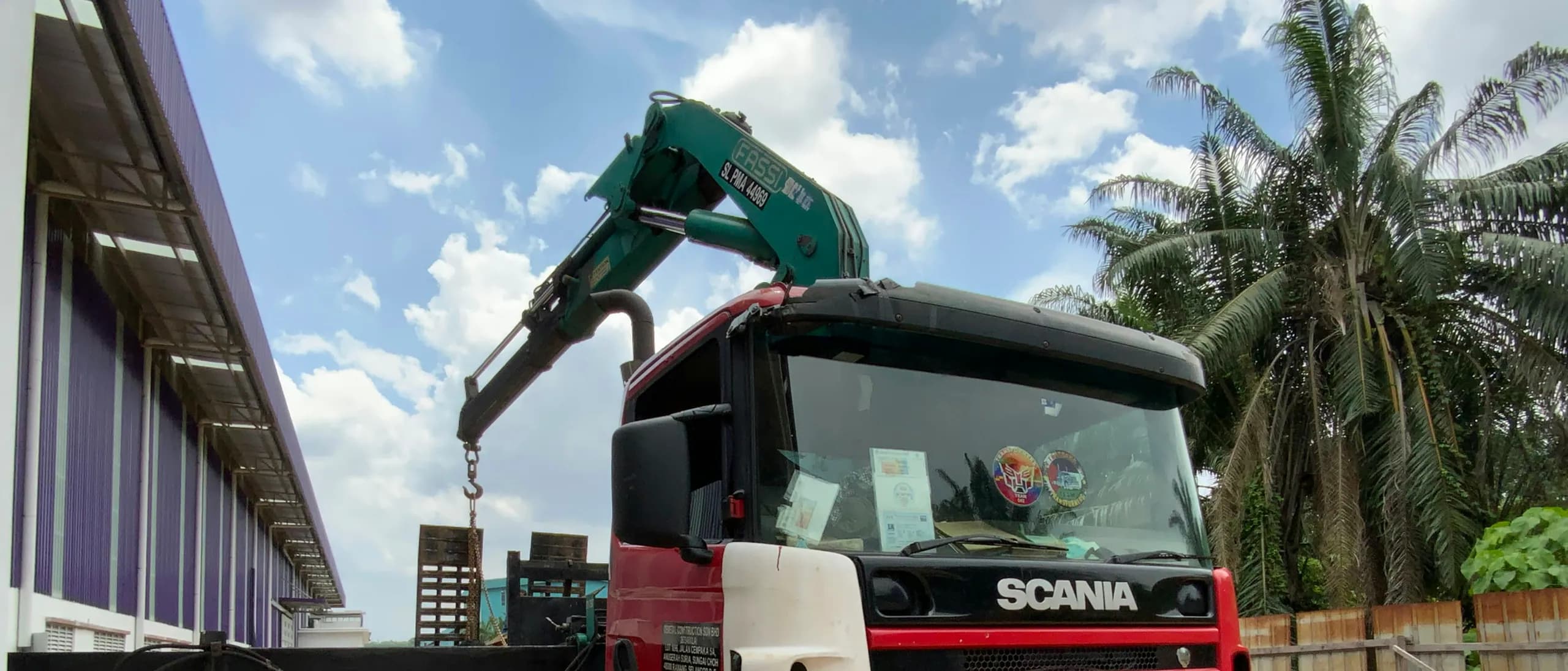 Knuckleboom Crane with Operator — tree care professionals at work