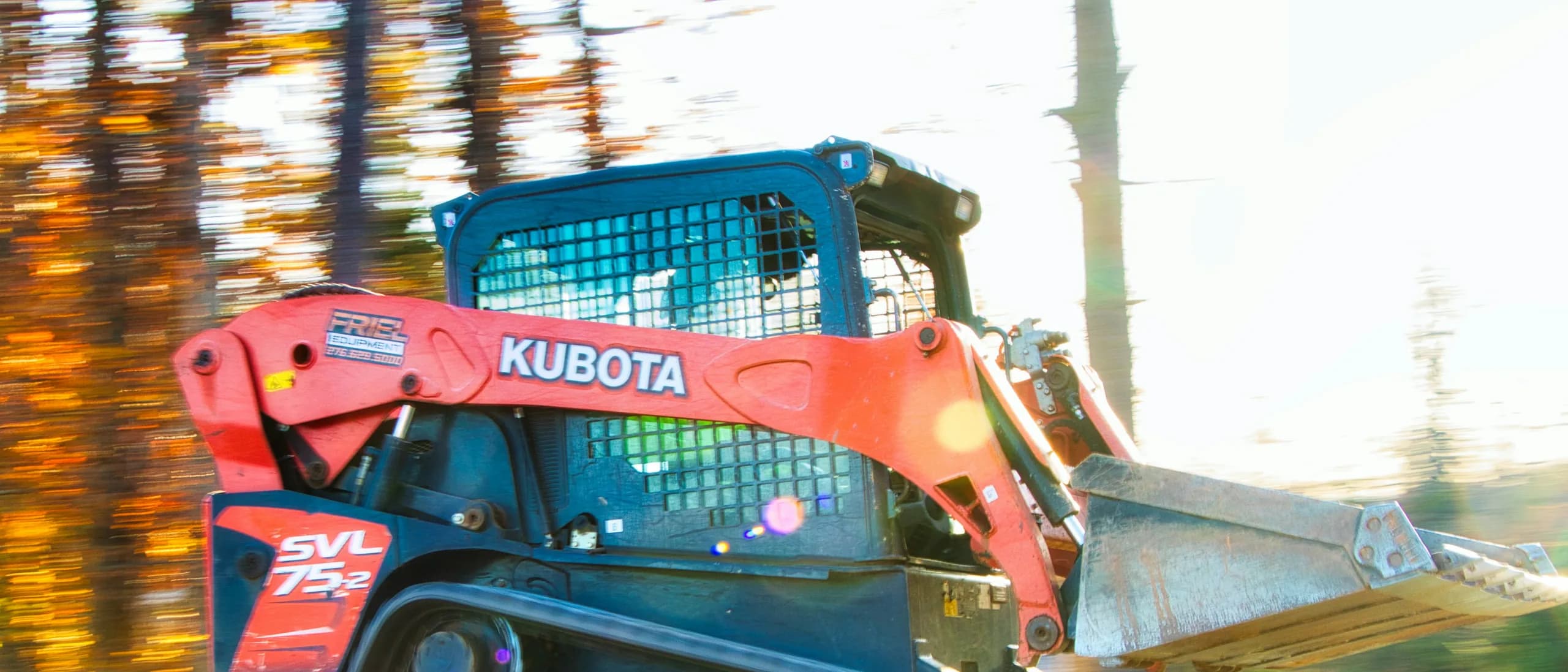 Skid Steer with Operator — tree care professionals at work
